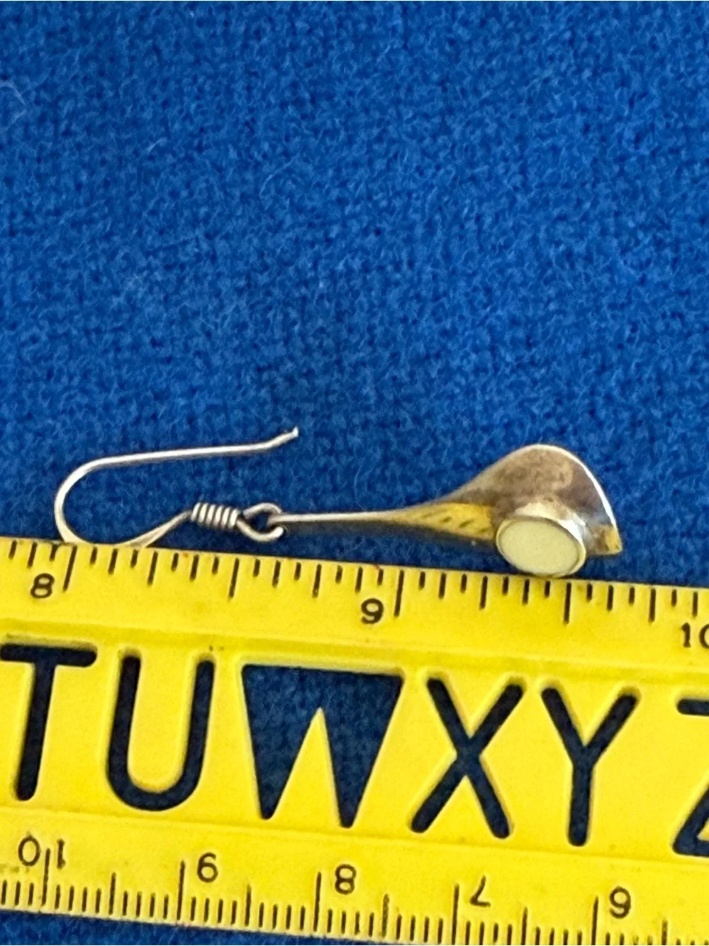 Sterling silver hammered back dangle earrings white stone?